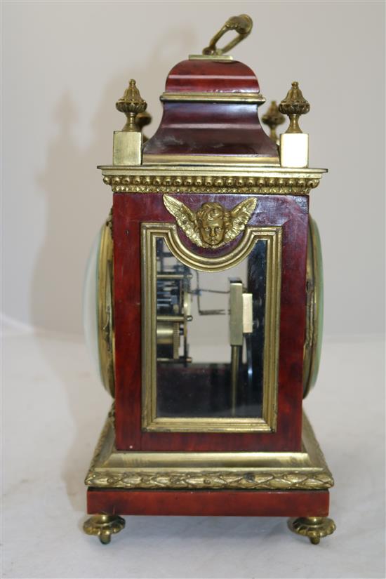 A Victorian ormolu mounted tortoiseshell mantel clock, 11.5in.